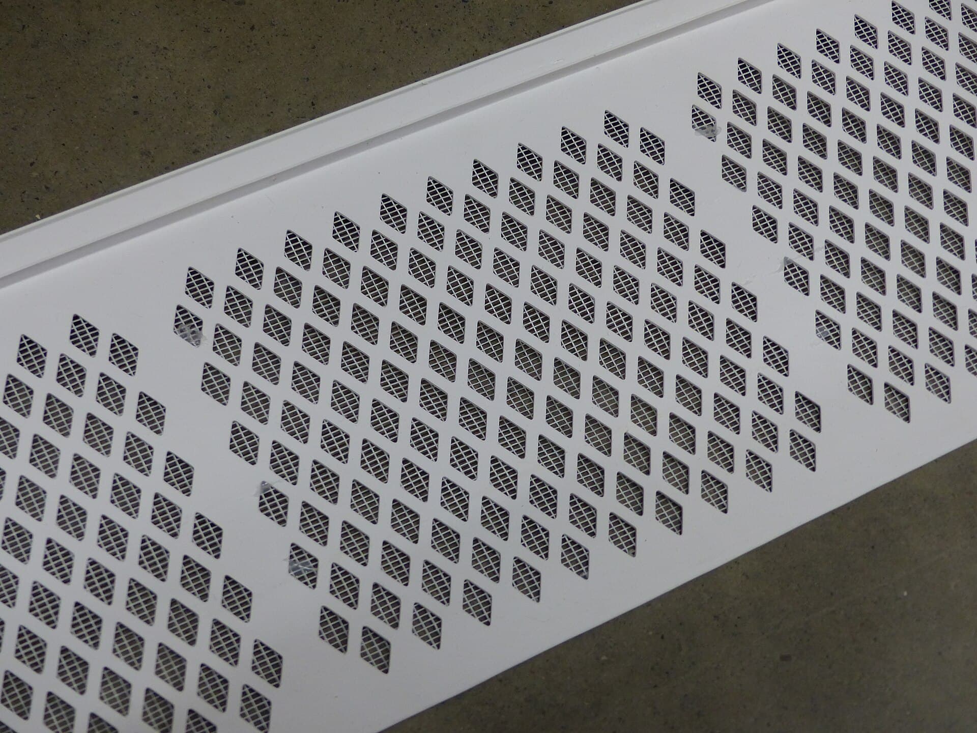 A snap-in gutter guard filter displayed for home improvement use.
